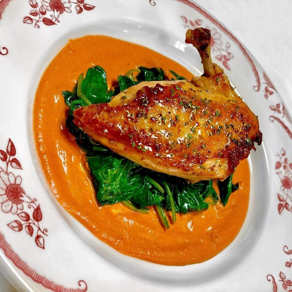 Lavender-glazed chicken with sauteed spinach at Le Margot in Fort Worth. Handout photo