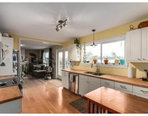 <p><a rel="nofollow noopener" href="https://www.zoocasa.com/search?listing-id=4248778" target="_blank" data-ylk="slk:20194 Wharf Street, Maple Ridge, B.C.;elm:context_link;itc:0;sec:content-canvas" class="link ">20194 Wharf Street, Maple Ridge, B.C.</a><br> Inside, there's an open floor plan.<br> Photo courtesy Zoocasa </p>