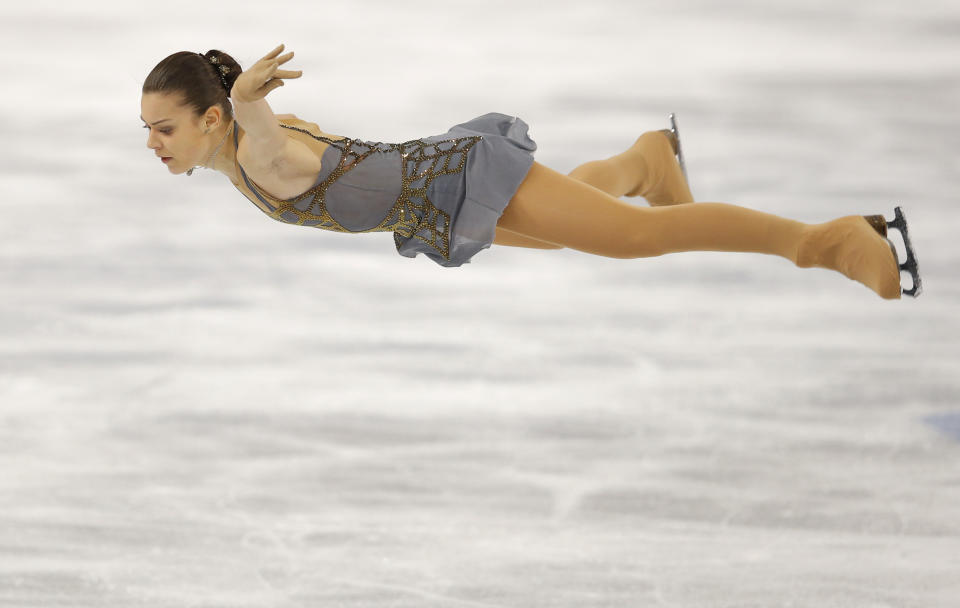 Adelina Sotnikova of Russia competes in the women's free skate figure skating finals at the Iceberg Skating Palace during the 2014 Winter Olympics, Thursday, Feb. 20, 2014, in Sochi, Russia. (AP Photo/Vadim Ghirda)