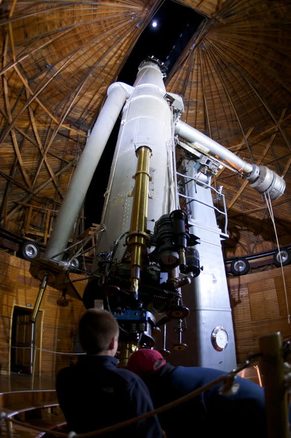 The moon shines above the Clark Telescope at the Lowell Observatory, Flagstaff, Arizona. File photo undated.