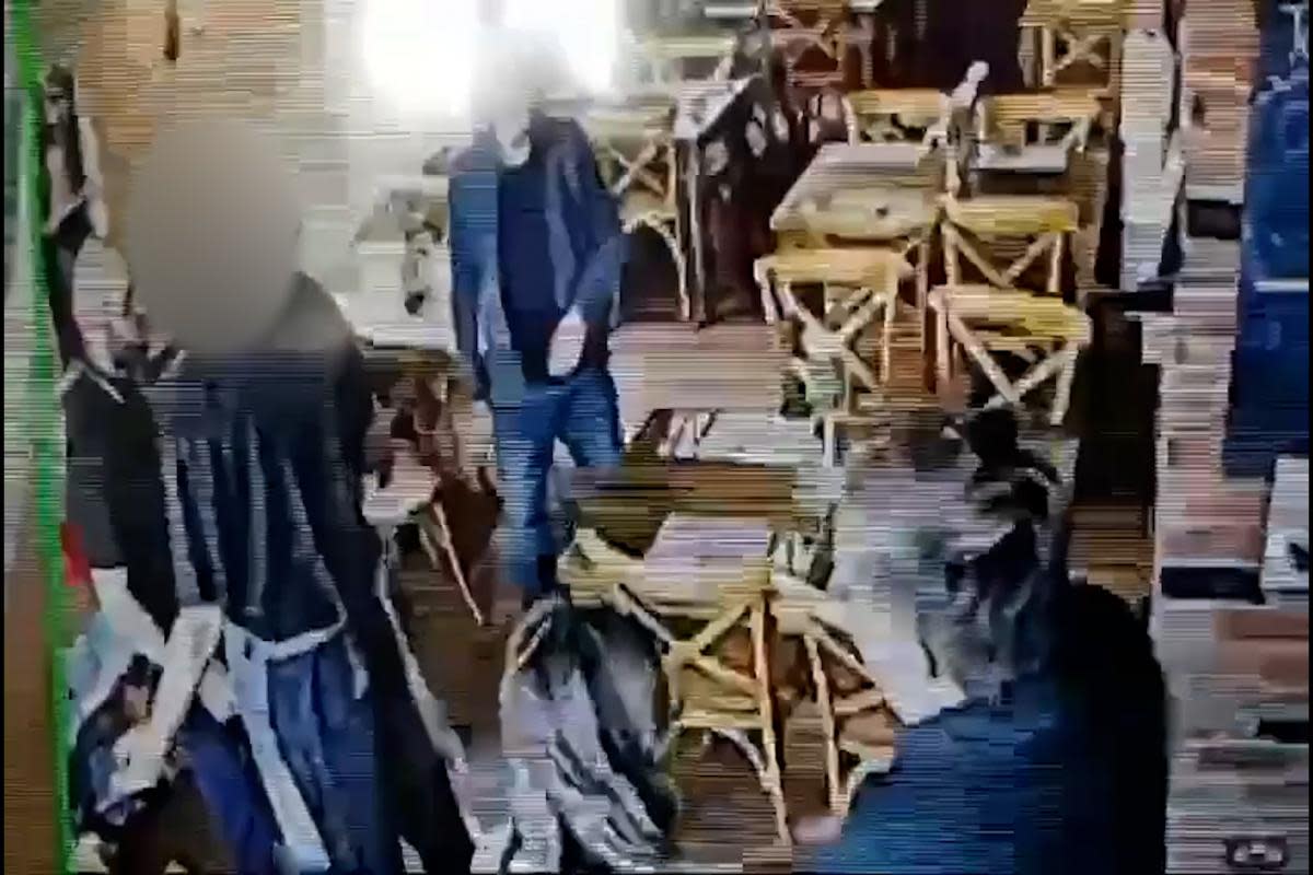 Caught on camera - a pair believed to have carried out a dine and dash <i>(Image: SWNS)</i>
