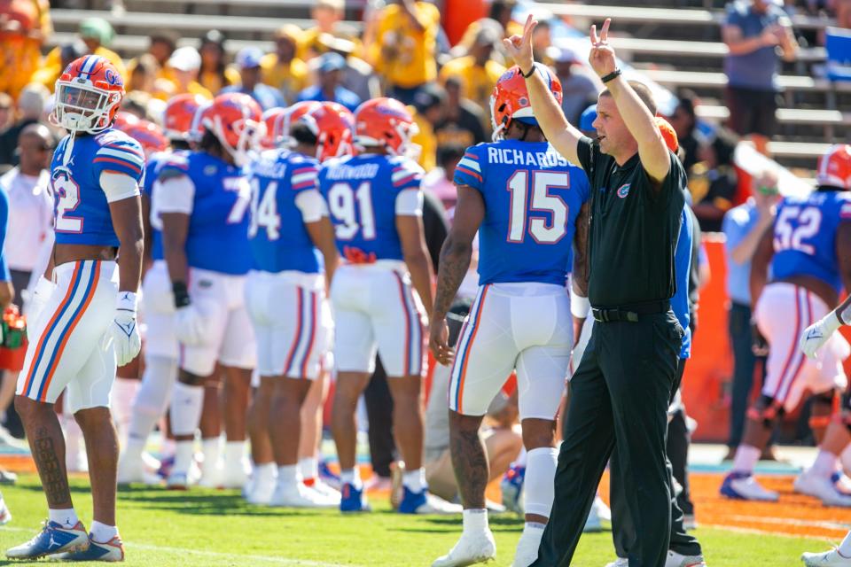 Florida hired Billy Napier (R) with the expectation of him restoring the football program to national prominence. His rivalry with LSU and newly hired coach Brian Kelly will play a big factor in deciding if UF made the right decision.