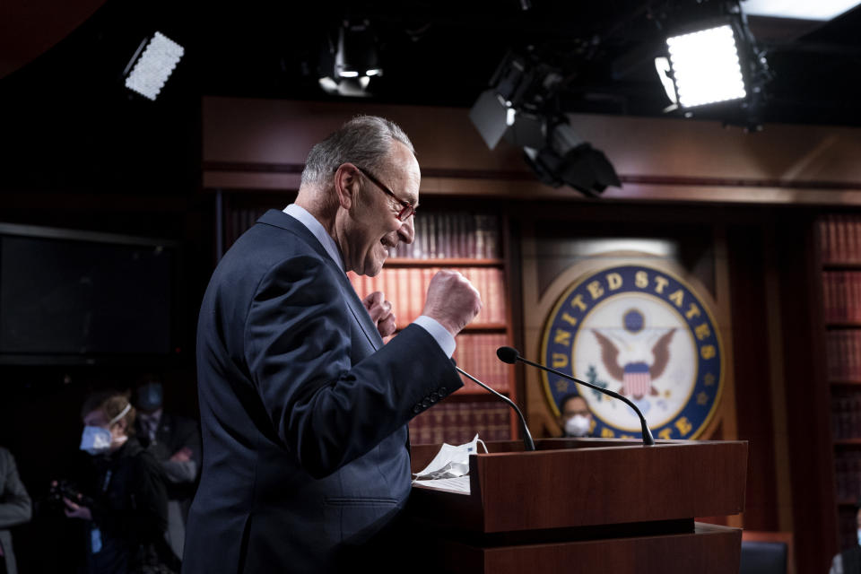 Senate Majority Leader Chuck Schumer, D-N.Y., praises his Democratic Caucus at a news conference just after the Senate narrowly approved a $1.9 trillion COVID-19 relief bill, at the Capitol in Washington, Saturday, March 6, 2021. Senate passage sets up final congressional approval by the House next week so lawmakers can send it to President Joe Biden for his signature. (AP Photo/J. Scott Applewhite)