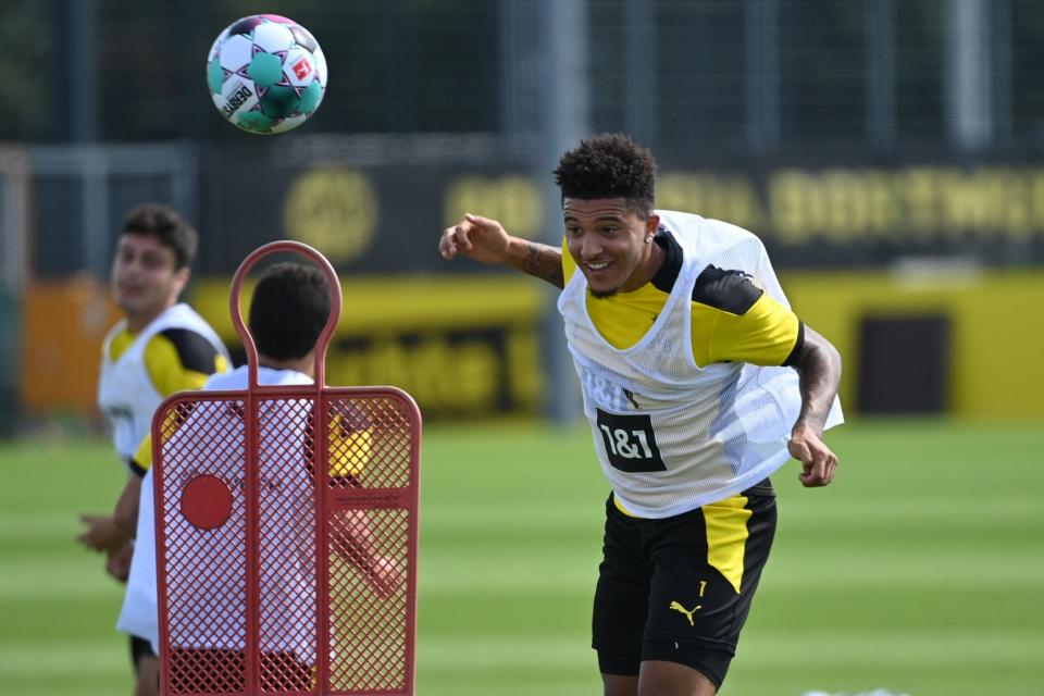 Manchester United are locked in talks with Borussia Dortmund over a deal for England forward Jadon Sancho (AFP via Getty Images)