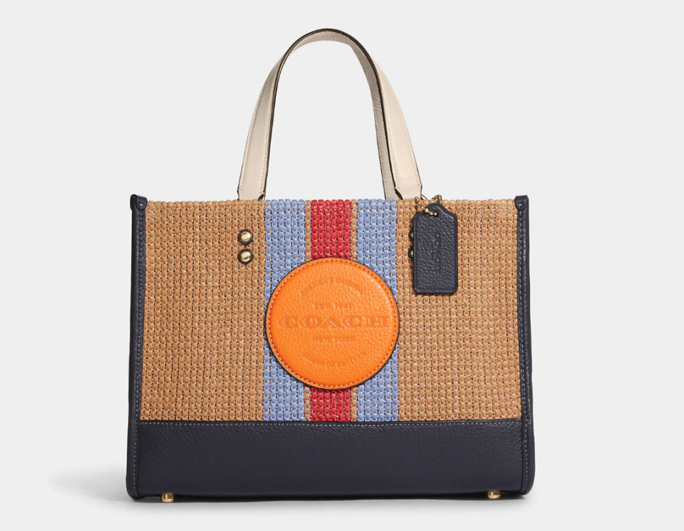 Dempsey Carryall With Coach Patch. (Image via Coach Outlet)