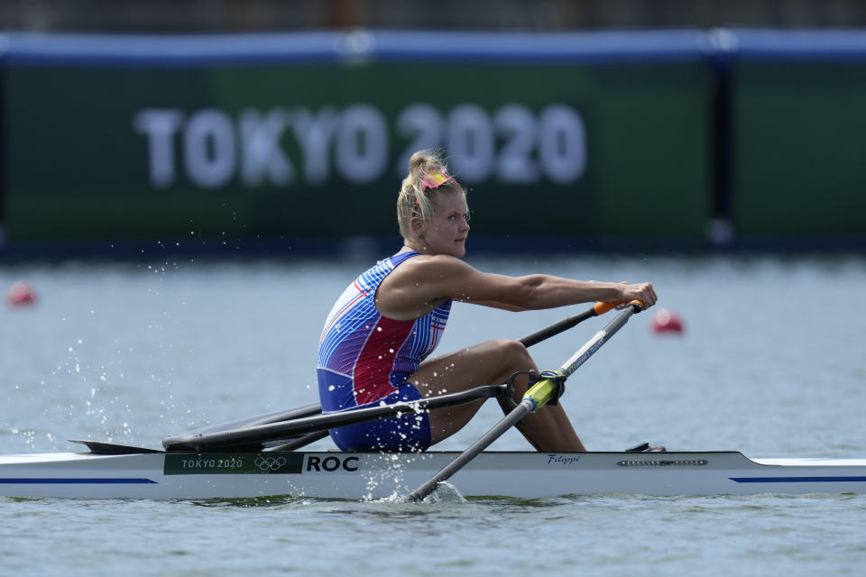 Hanna Prakatsen of the Russian Olympic Committee competes during the women's rowing single sculls at the 2020 Summer Olympics, Friday, July 23, 2021, in Tokyo, Japan. (AP Photo/Lee Jin-man)