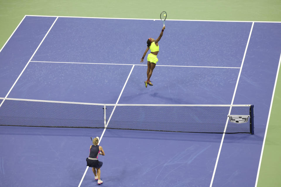 Coco Gauff, of the United States, returns a shot to Laura Siegemund, of Germany, during the first round of the U.S. Open tennis championships, Monday, Aug. 28, 2023, in New York. (AP Photo/Jason DeCrow)