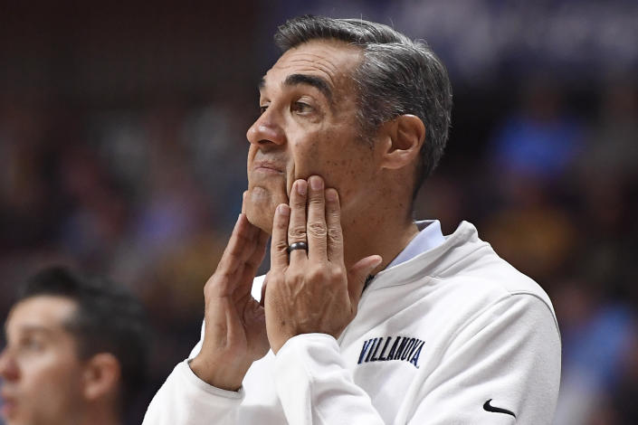 Villanova head coach Jay Wright watches play in the first half of an NCAA college basketball game against Purdue, Sunday, Nov. 21, 2021, in Uncasville, Conn. (AP Photo/Jessica Hill)