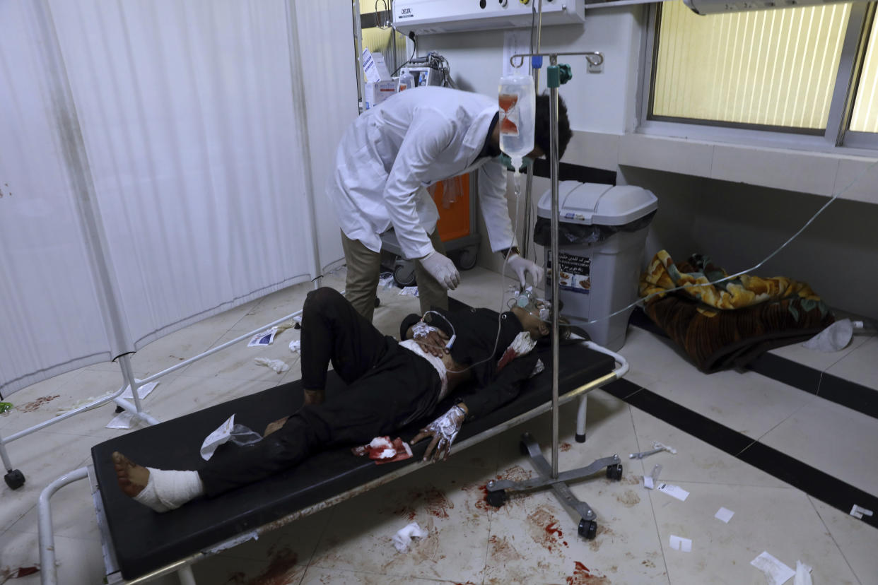 An Afghan school student is treated at a hospital after a bomb explosion near a school in west of Kabul, Afghanistan, Saturday, May 8, 2021. A bomb exploded near a school in west Kabul on Saturday, killing several people, many them young students, an Afghan government spokesmen said. (AP Photo/Rahmat Gul)