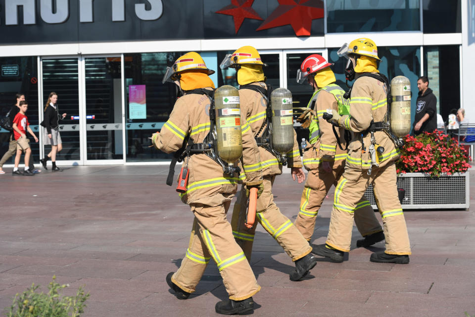 Fire and Rescue officers inspect the Westpac Bank. Photo: AAP