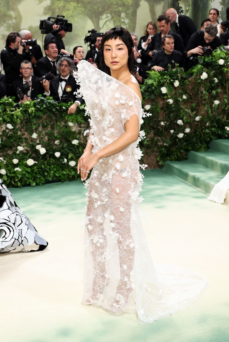 new york, new york may 06 greta lee attends the 2024 met gala celebrating sleeping beauties reawakening fashion at the metropolitan museum of art on may 06, 2024 in new york city photo by jamie mccarthygetty images