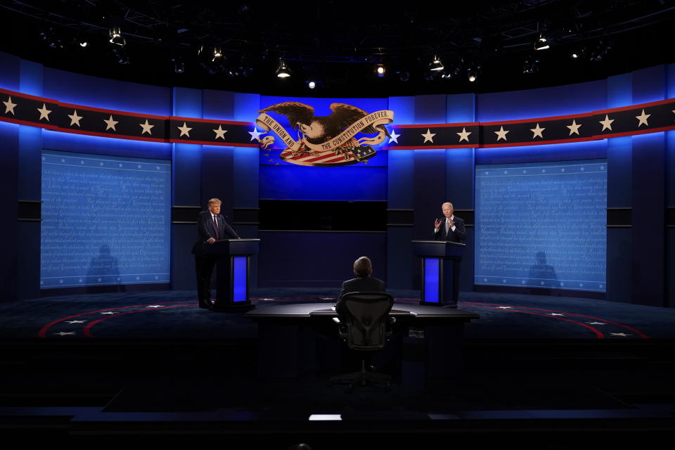 FILE - In this Sept. 29, 2020, file photo President Donald Trump, left, and Democratic presidential candidate former Vice President Joe Biden, right, participate in the first presidential debate with moderator Chris Wallace of Fox News, center, Case Western University and Cleveland Clinic, in Cleveland, Ohio. Even before Trump's hospitalization, Republicans were growing increasingly concerned about the direction of the election. Trump's allies were particularly worried that his troubling debate performance on Tuesday might further alienate key groups of swing voters: women and college-educated voters, among them. (AP Photo/Patrick Semansky, File)