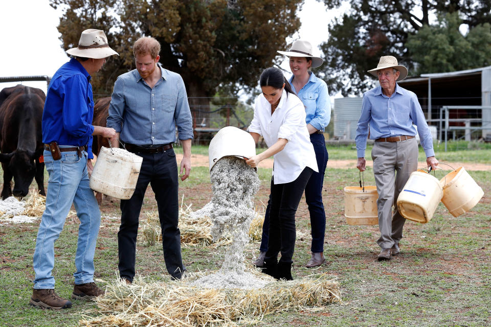 The royal couple took a hands-on approach during their visit. Photo: Getty