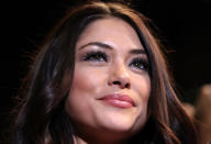 AITAMA, JAPAN - FEBRUARY 26: UFC Octagon Girl Arianny Celeste introduces round three during the Rampage v Bader bout during the UFC 144 event at Saitama Super Arena on February 26, 2012 in Saitama, Japan.