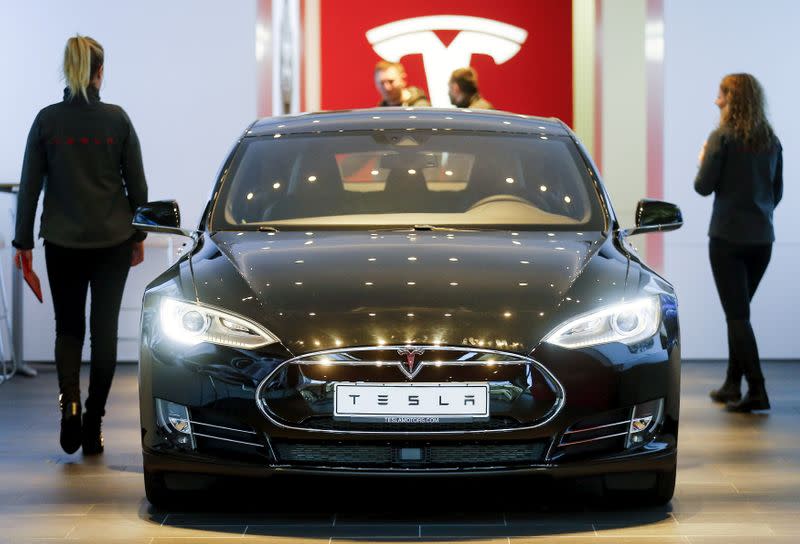 FILE PHOTO: A Tesla car 'Model S' sits in a dealership in Berlin