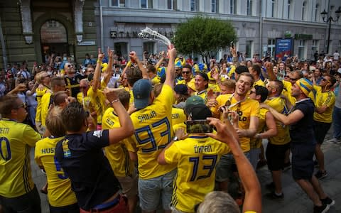 Swedish football fans are in high spirits ahead of Sweden's opening match - Credit: Reuters/Reuters 