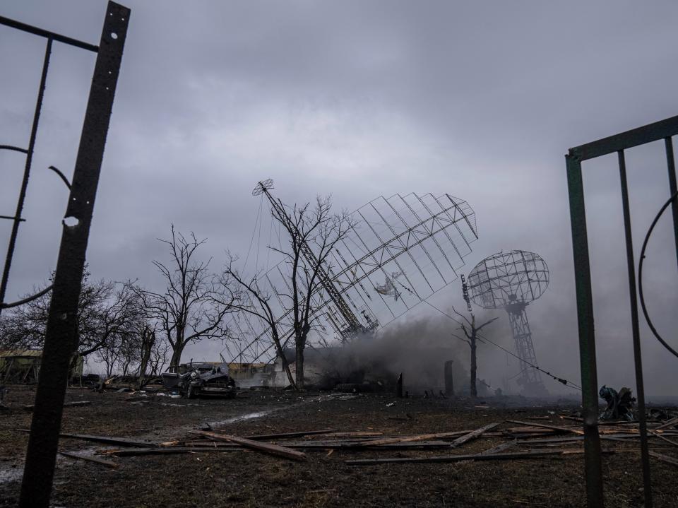 Smoke rise from an air defence base in the aftermath of an apparent Russian strike in Mariupol in Ukraine (AP)