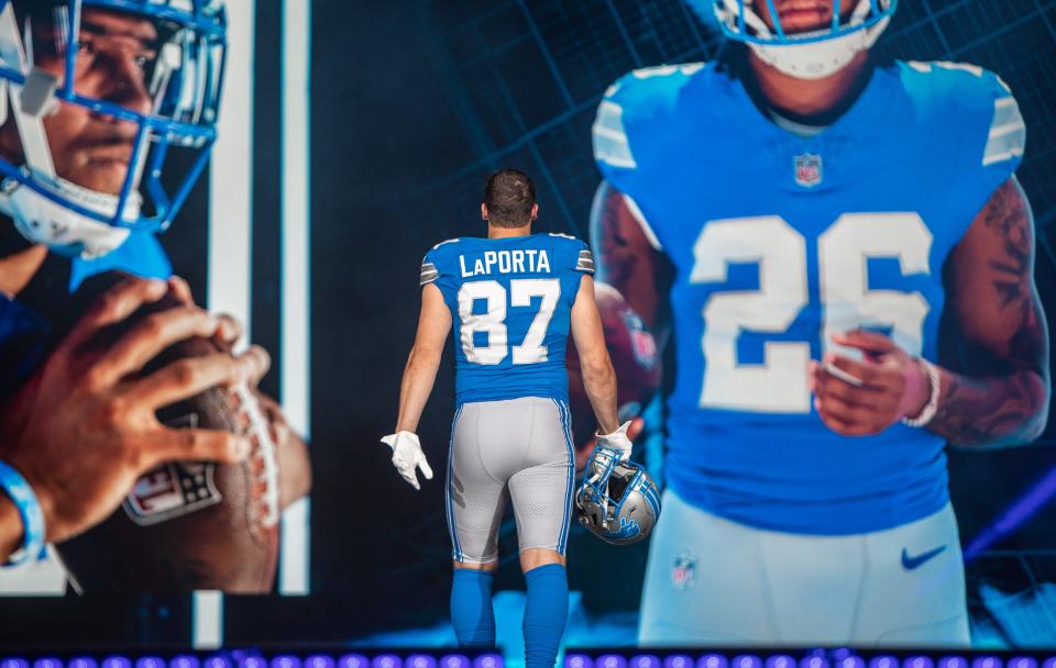 Sam LaPorta (87) walks on stage during the Detroit Lions' new uniform reveal event inside Ford Field in Detroit on Thursday, April 18, 2024.