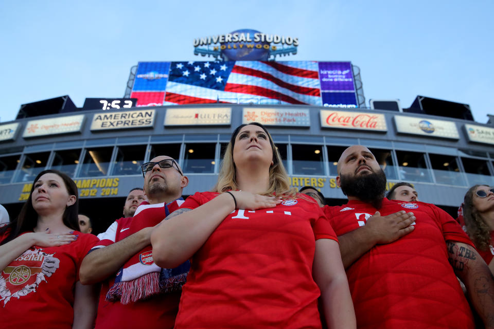 CARSON, CALIFORNIA - JULY 17: Supporters of Bayern Muenchen seen at the national anthem of the USA prior to the 2019 International Champions Cup match between Arsenal London and FC Bayern Muenchen at Dignity Health Sports Park on July 17, 2019 in Carson, California. (Photo by Alexander Hassenstein/Bongarts/Getty Images)