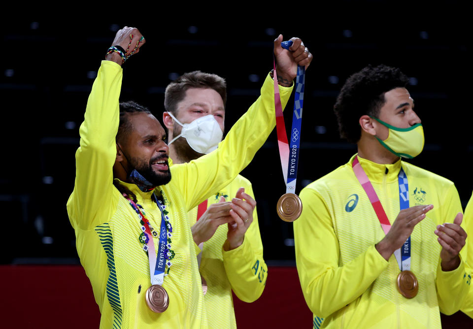 SAITAMA, JAPAN - AUGUST 07: Patty Mills of Team Australia celebrates with his bronze medal during the Men's Basketball medal ceremony on day fifteen of the Tokyo 2020 Olympic Games at Saitama Super Arena on August 07, 2021 in Saitama, Japan. (Photo by Kevin C. Cox/Getty Images)