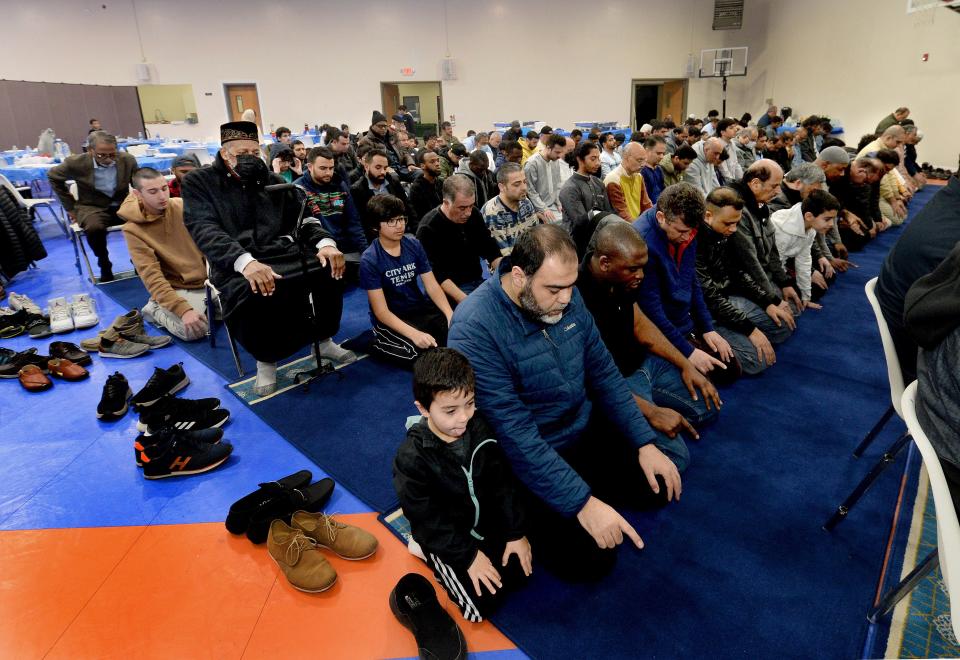 Muslim men pray Saturday after sunset, April 1, 2023, at the Al Noor Community Center in Springfield during Ramadan.