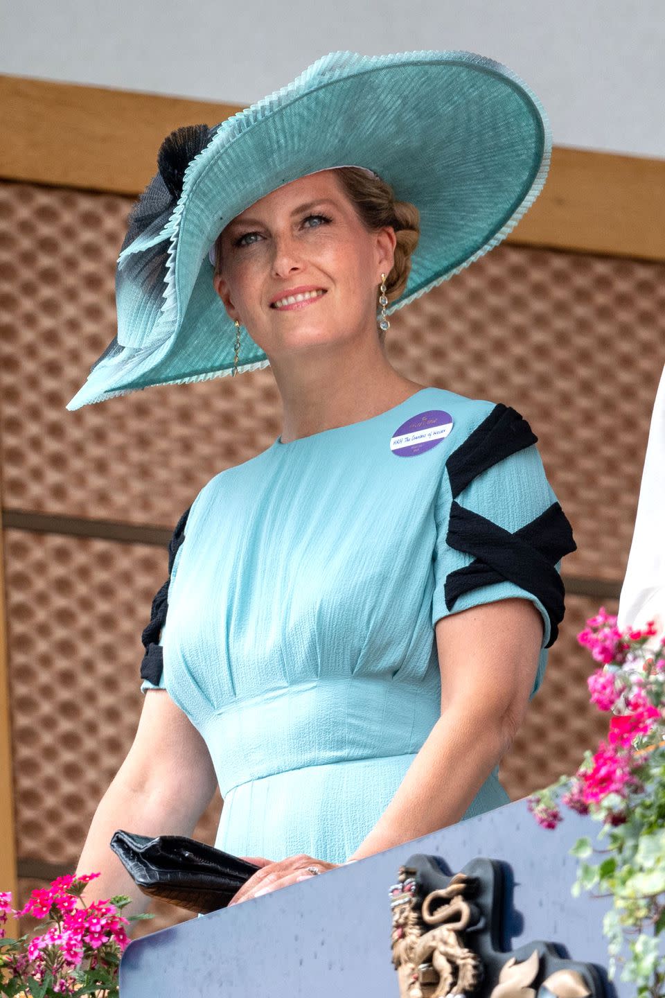 <p>Sophie, Countess of Wessex, wore a robin's egg blue pleated hat with black accents.</p>