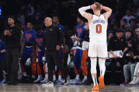 New York Knicks guard Donte DiVincenzo (0) reacts during the first half of Game 7 in an NBA basketball second-round playoff series against the Indiana Pacers, Sunday, May 19, 2024, in New York. (AP Photo/Julia Nikhinson)