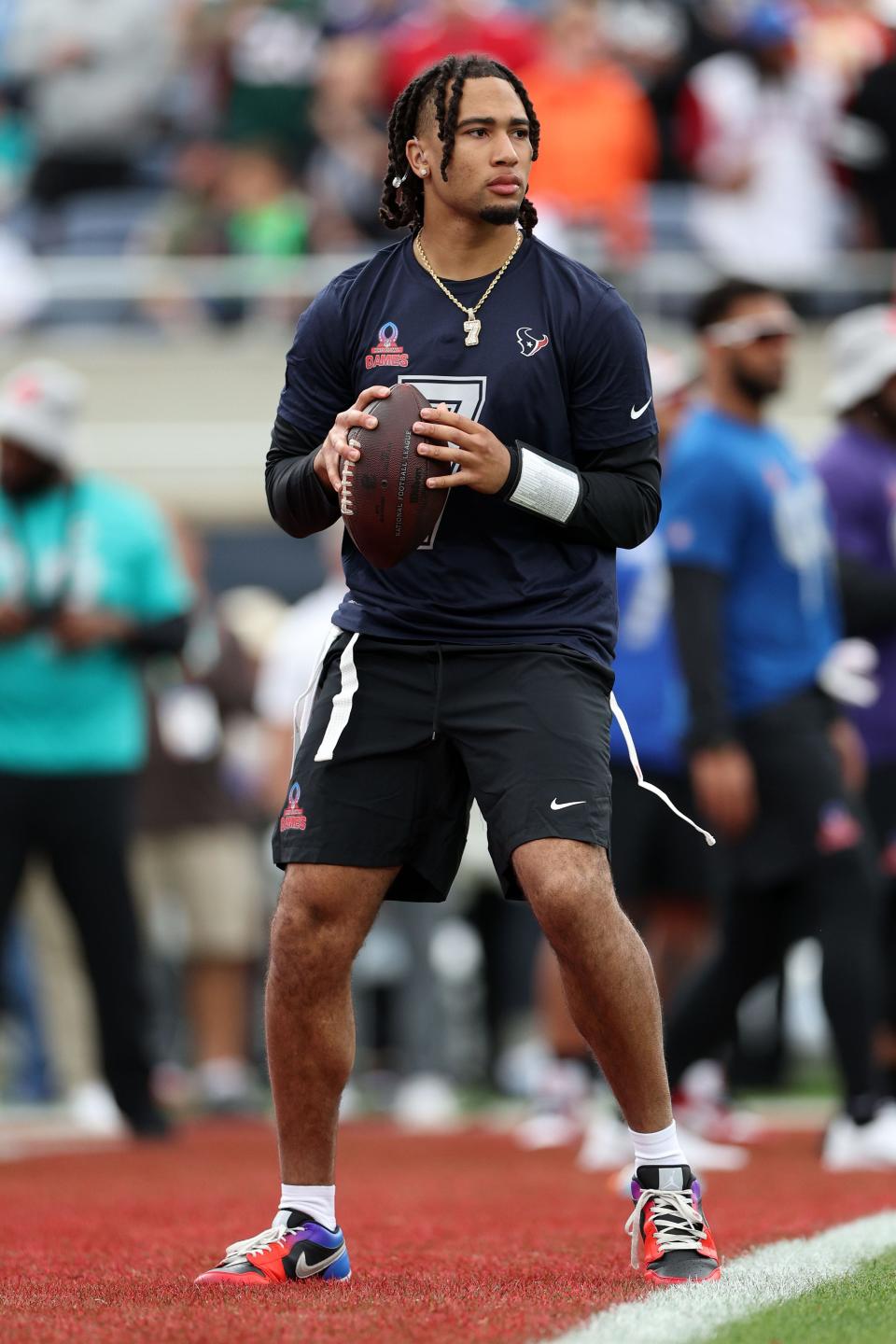 Feb 4, 2024; Orlando, FL, USA; AFC quarterback C.J. Stroud (7) of the Houston Texans before the 2024 Pro Bowl at Camping World Stadium. Mandatory Credit: Nathan Ray Seebeck-USA TODAY Sports