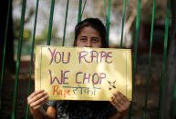 <p>A girl holds a placard as she takes part in a movement against rapes on the occasion of International Women’s Day in New Delhi, India, March 8, 2018. (Photo: Adnan Abidi/Reuters) </p>