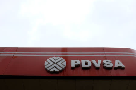 The corporate logo of the Venezuelan state-owned oil company PDVSA is seen at a gas station in Caracas, Venezuela September 24, 2018. REUTERS/Marco Bello