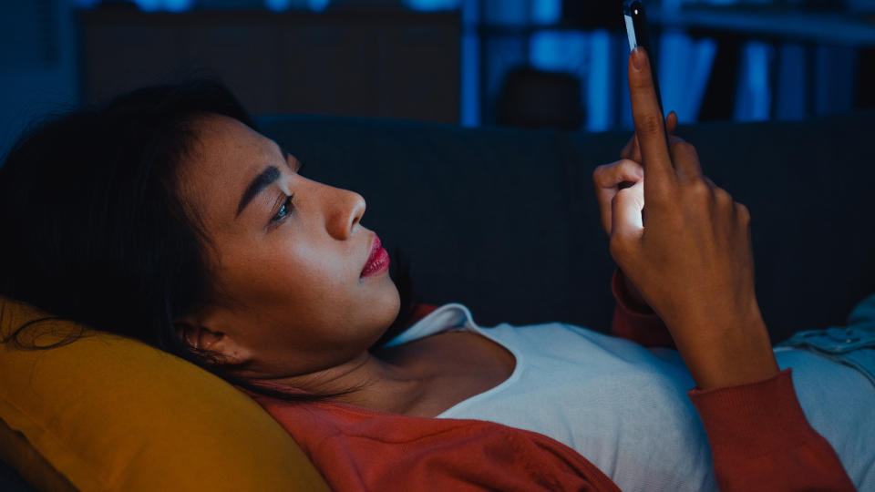 Woman googling symptoms. (Getty Images)