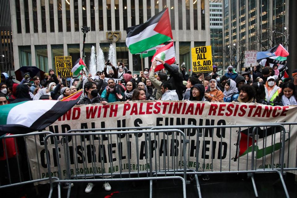 PHOTO: Pro-Palestinian protesters gather outside Radio City Music Hall ahead of a fundraiser for President Joe Biden, on March 28, 2024, in New York. (Leonardo Munoz/AFP via Getty Images)