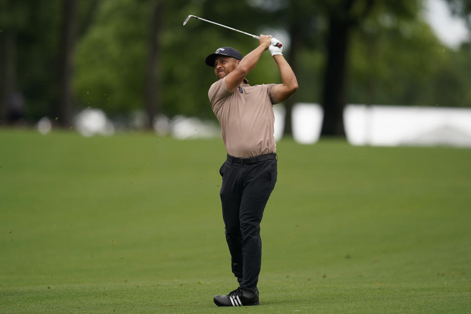 Xander Schauffele hits from the fairway on the first hole during the first round of the Wells Fargo Championship golf tournament at the Quail Hollow Club Thursday, May 9, 2024, in Charlotte, N.C. (AP Photo/Erik Verduzco)