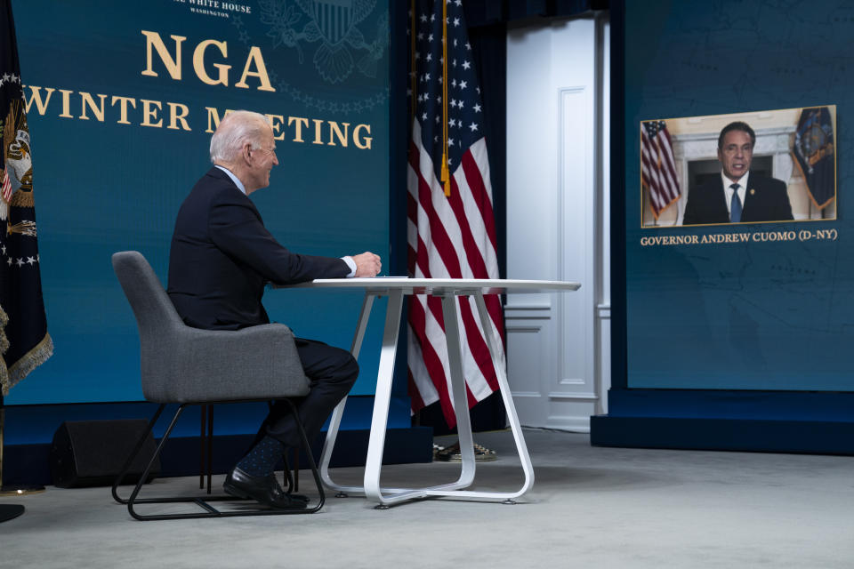 President Joe Biden listens as Gov. Andrew Cuomo, D-N.Y., speaks during a virtual meeting of the National Governors Association, in the South Court Auditorium on the White House campus, Thursday, Feb. 25, 2021, in Washington. (AP Photo/Evan Vucci)