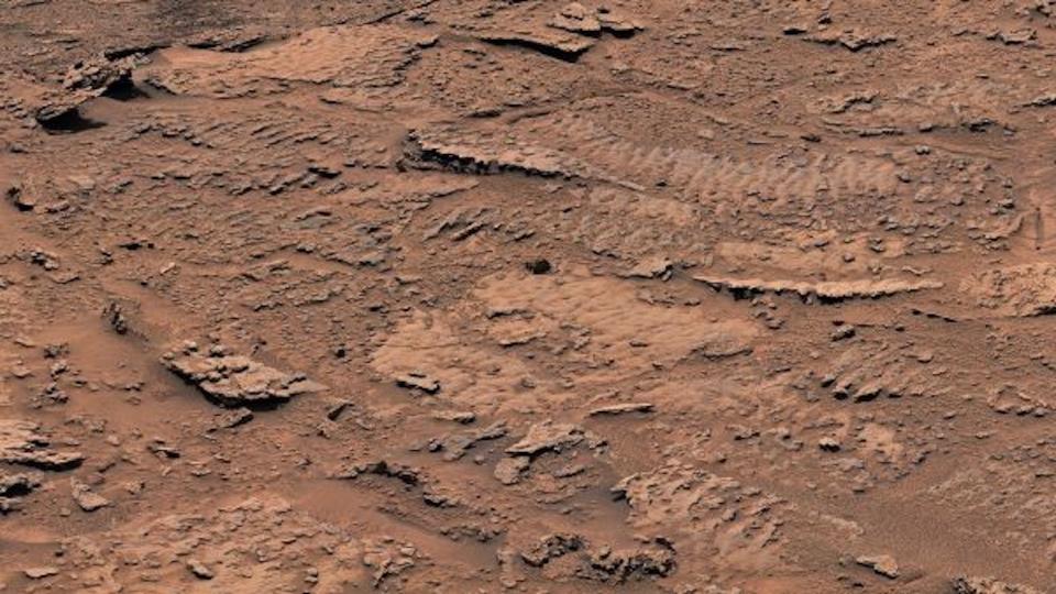 The bumpy texture of these rocks is the clearest evidence yet from Mount Sharp of an ancient Martian lake. Billions of years ago, wind playing across the surface of a shallow lake disturbed the lake-bottom sediments, which eventually became these rocks.