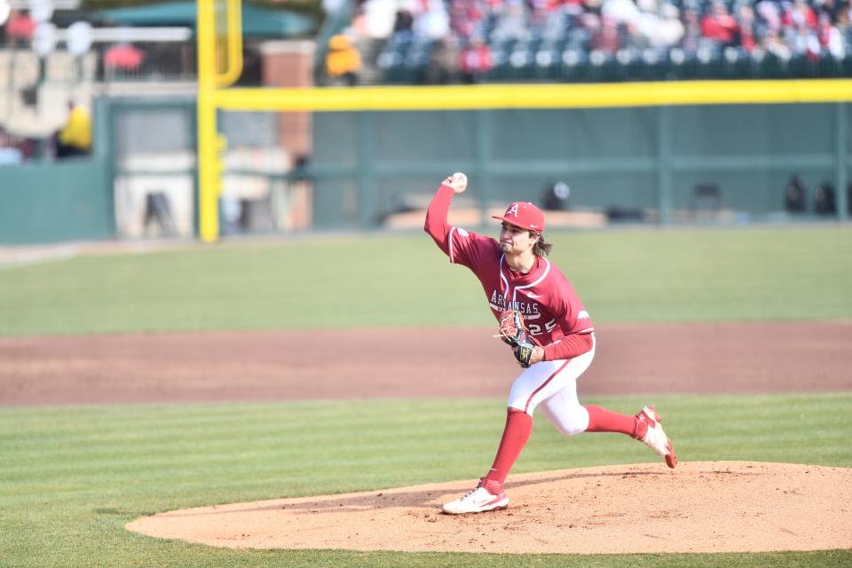 Arkansas baseball's Brady Tygart fires a pitch during the Razorbacks 15-5 win over James Madison during Opening Weekend.