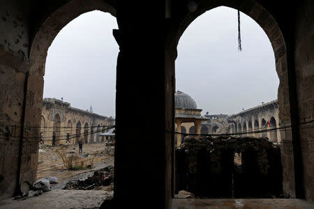 Damage is seen inside Aleppo's Umayyad mosque, Syria December 13, 2016. REUTERS/Omar Sanadiki