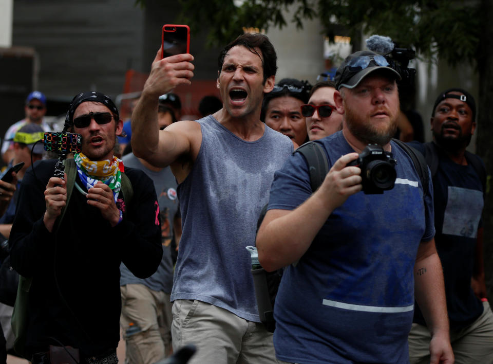 <p>Counter-protesters shout near a white nationalist-led rally marking the one year anniversary of the 2017 Charlottesville ‘Unite the Right’ protests, in Washington, D.C. August 12, 2018. (Photo: Jim Urquhart/Reuters) </p>