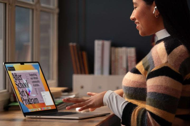 A woman working on a 2023 MacBook Air with M2 chip.