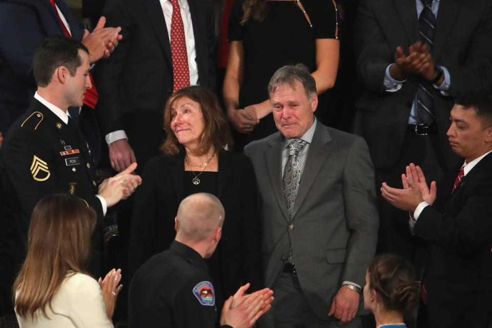 Parents of Otto Warmbier, Fred and Cindy Warmbier are acknowledged during the State of the Union address in the chamber of the U.S. House of Representatives January 30, 2018 in Washington, DC. This is the first State of the Union address given by U.S. President Donald Trump and his second joint-session address to Congress.