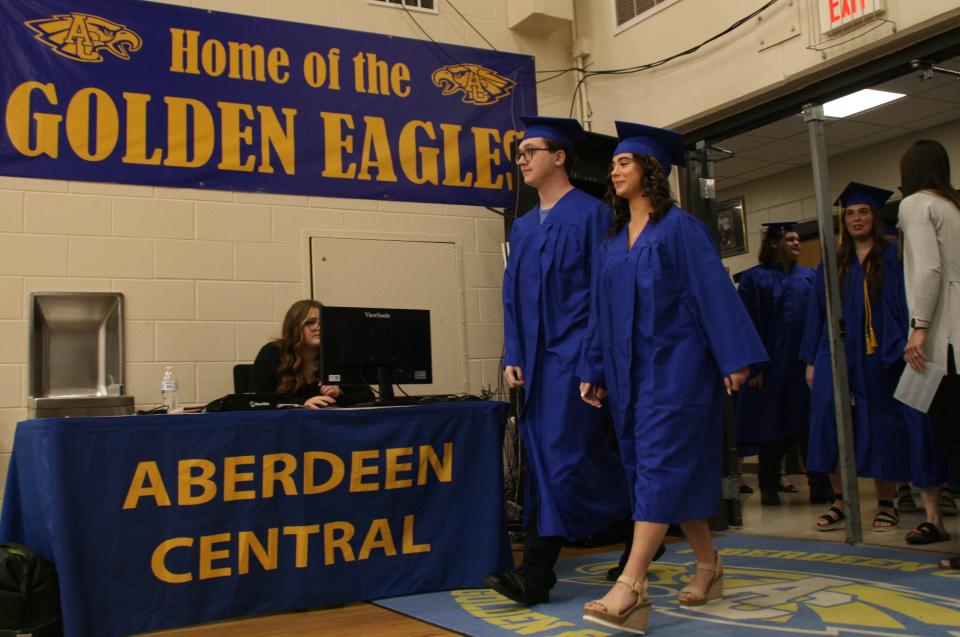 Seniors walk into Sunday afternoon's Central High School graduation ceremony at Golden Eagles Arena.