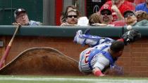 Jun 23, 2018; Cincinnati, OH, USA; Chicago Cubs catcher Willson Contreras (40) kicks up the on-deck circle as he misses a foul ball from Cincinnati Reds starting pitcher Anthony DeSclafani during the second inning at Great American Ball Park. Mandatory Credit: David Kohl-USA TODAY Sports