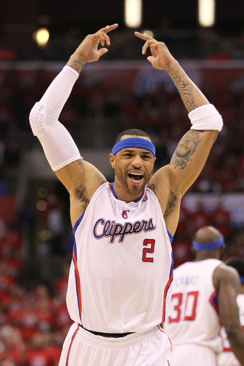 LOS ANGELES, CA - MAY 11: Kenyon Martin #2 of the Los Angeles Clippers reacts after dunking the ball in the second quarter against the Memphis Grizzlies in Game Six of the Western Conference Quarterfinals in the 2012 NBA Playoffs on May 11, 2012 at Staples Center in Los Angeles, California. NOTE TO USER: User expressly acknowledges and agrees that, by downloading and or using this photograph, User is consenting to the terms and conditions of the Getty Images License Agreement. (Photo by Stephen Dunn/Getty Images)