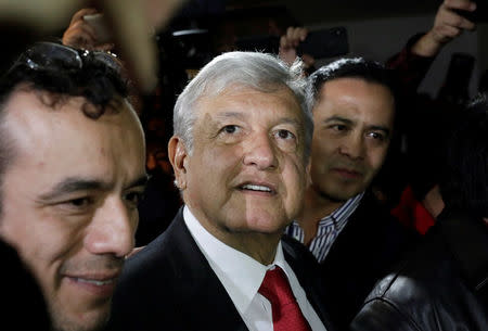 Andres Manuel Lopez Obrador leaves after being sworn-in as presidential candidate of the National Regeneration Movement (MORENA) during the party's convention at a hotel in Mexico City, Mexico February 18, 2018. REUTERS/Henry Romero