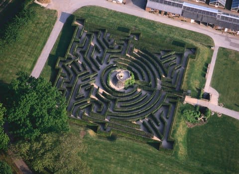 The maze at Leeds Castle comprises 2,400 yew trees - Credit: GETTY