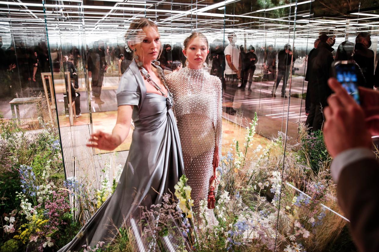 <p>Kate Moss and her daughter Lila on the catwalk at a Fendi fashion show in Paris</p> (AP)