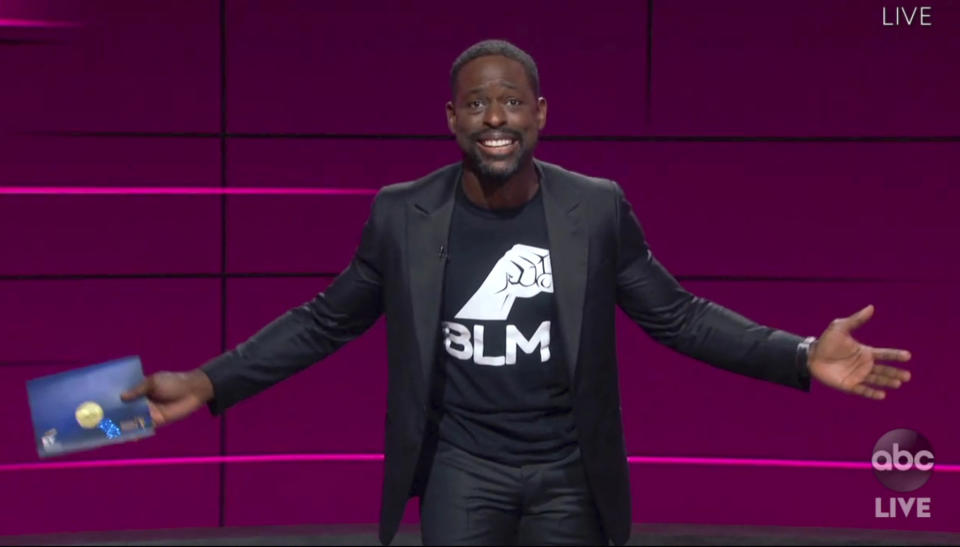 In this video grab captured on Sept. 20, 2020, courtesy of the Academy of Television Arts & Sciences and ABC Entertainment, Sterling K. Brown presents the award for outstanding drama series during the 72nd Emmy Awards broadcast. (The Television Academy and ABC Entertainment via AP)