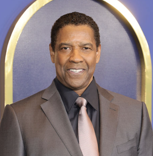 closeup of an older denzel smiling in a suit