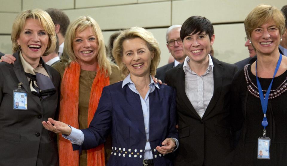 From left, defense ministers, Albania's Mimi Kodheli, Netherland's Jeanine Hennis-Plasschaert, Germany's Ursula von der Leyen, Norway's Ine Marie Eriksen Soreide and Italy's Roberta Pinotti pose for photographers prior to the start of a meeting of defense ministers of the North Atlantic Council at NATO headquarters in Brussels on Wednesday, Feb. 26, 2014. Frustrated with his Afghan counterpart, U.S. President Barack Obama is ordering the Pentagon to accelerate planning for a full U.S. troop withdrawal from Afghanistan by the end of this year. But Obama is also holding out hope that Afghanistan's next president may eventually sign a stalled security agreement that could prevent the U.S. from having to take that step. (AP Photo/Virginia Mayo)