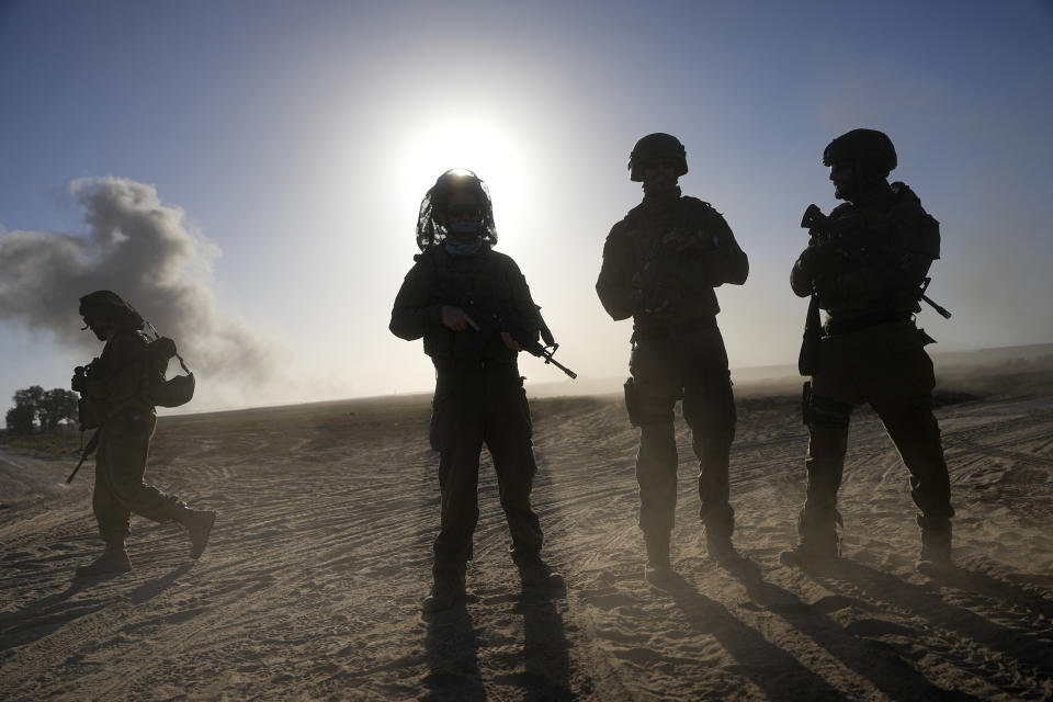 Israeli soldiers are seen near the Gaza Strip border in southern Israel, Monday, March 4, 2024. The army is battling Palestinian militants across Gaza in the war ignited by Hamas' Oct. 7 attack into Israel. (AP Photo/Ohad Zwigenberg)